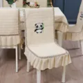 Detail of beige quilted chair cover with cute embroidered panda holding bamboo - Chair Cover / Panda Beige