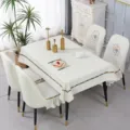Elegant dining room scene with white quilted chair covers and matching tablecloth - Universal Chair Cover for Shallow Arc 8-11 cm / Happiness Flower Off-white