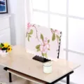Floral print computer monitor dust cover with decorative wavy edges in a home setting - Peony Beige