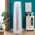 White lace mesh dust cover for cylindrical floor-standing air conditioners in home setting - Butterfly Love White