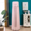 Pink lace cylindrical air conditioner dust cover in a cozy home living room setting - Pink Butterfly