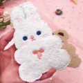 Detailed close-up showing the soft texture of a cute white rabbit plush bus card holder sleeve - Rabbit / White