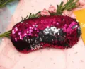 Close-up detail of reversible magenta and silver sequins on the mermaid eye mask - Fuchsia and Silver