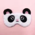 Cute plush panda sleep eye mask for blackout rest shown on a minimal soft pink background - Panda / Black and White