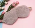 Close-up detail showing the soft plush texture of this fuzzy faux fur sleep eye mask for rest - Camel