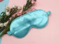 Premium sky blue faux silk eye mask for sleep featuring a comfortable elastic strap - Fresh Green