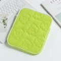 Macro view showing the soft quilted flower texture of this lime green iPad storage bag - 24*2*30cm / Grass Green