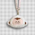 Simpatica custodia per auricolari in peluche a forma di mostro con cordino decorato - Versione Tracolla Stampata / Bianco latte