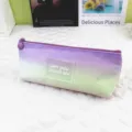 Detailed view of tie-dye pencil case featuring purple-green gradient and frosted patch - Purple