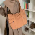 Μεγάλη πορτοκαλί υφασμάτινη τσάντα για γυναίκες, ιδανική για μετακινήσεις και καθημερινή χρήση - Καφέ