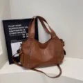 Large capacity brown faux leather tote bag featuring dual top handles and shoulder strap - Brown