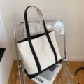 Bolso tote de lona minimalista de gran capacidad en blanco roto y negro para uso diario - Negro