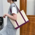 Large capacity cream canvas tote bag with purple contrast straps and bottom trim - Purple