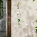 Exquisito atrapasueños de colibrí con espiral de cristal verde y reflejos - Colibrí Verde