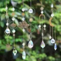 Detailansicht von böhmischen Kristall-Sonnenfängern mit Motiven von Mond, Sonne und Lotus - 6-Teiliges Set Stil B / Gold