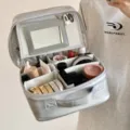 Detail view of the silver PU makeup bag interior with mirror and adjustable dividers - Multifunctional With Mirror / Silver
