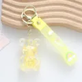 Cute yellow bear quicksand keychain with sparkling liquid stars and rainbow strap design - Teddy Bear / Yellow