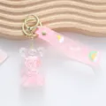 Cute pink liquid quicksand bear keychain with silicone wrist strap and rainbow charms - Teddy Bear / Pink