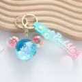 Cute blue quicksand bubble keychain with colorful beads and soft silicone strap charm - Mickey Style / Blue