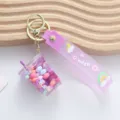 Cute purple liquid quicksand milk tea cup keychain with colorful beads and wish strap - Liquid Milk Tea Cup / Purple