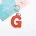 Modischer Schlüsselanhänger aus orangefarbenem PU-Leder Buchstabe G mit Herzanhänger - Buchstabe G