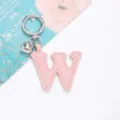 Pinker Schlüsselanhänger aus PU-Leder, Buchstabe W, mit silbernem Herz und Metallring - Buchstabe W