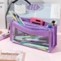 Close-up of purple large capacity transparent pencil case featuring three secure zipper sections - Regular / Violet