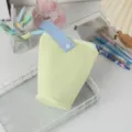 Astuccio verticale minimalista in tela gialla con cinturino blu e bottone - Giallo