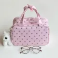 Rosa gepunktete PU-Make-up-Tasche mit drei Lagen für die Reise und Kosmetikaufbewahrung - Rosa und Kaffee Alternative