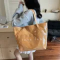 Große gelbe DuPont-Papier und PVC Jelly-Tragetasche mit TOTE BAG-Aufdruck auf der Vorderseite. - Braun