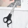 Professional pet grooming scissors featuring black ergonomic handles and stainless steel blades - Black Handle Straight Scissors / 17cm