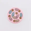 Interactive pink circular pet slow feeder puzzle toy with multi-colored bone sliders - Disc Puzzle Toy / Pink