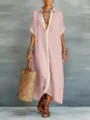 Detail closeup view of the elegant color-block linen shirt dress with contrast lapel. - S / Pink