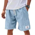Pantalones cortos casuales texturizados para hombre con cordón, bolsillo y etiqueta de dobladillo. - S / Azul cielo