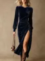 Detailed view of women's elegant long-sleeve velvet evening dress with high slit in dark blue. - S / Navy Blue