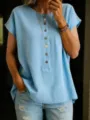 Close-up detail of light blue short sleeve button placket top with casual comfortable fit. - S / Tops / Sky Blue