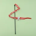 Divertente giocattolo interattivo per gatti a forma di serpente di peluche rosso a pois. - Occhi Grandi Rossi