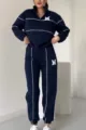 Women navy blue zip-up sweatshirt and sweatpants track suit set with white piping. - Navy Blue