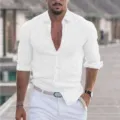 Detailed view of men's casual long-sleeve linen shirt in white beach style design. - S / White
