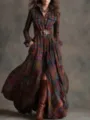 Close-up detail of the vintage plaid maxi dress featuring long sleeves and wide belt styling. - S / Dresses / No. 1 - Red