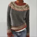 Close-up view of the knitted sweater showing the exquisite colorblock and fair isle collar pattern. - S / Dark Gray
