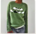 Green wool knit sweater for women featuring cute black and white sheep pattern long sleeves. - S / Tops / Green Sheep
