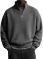 Sudadera gris oscura de punto waffle con media cremallera, cuello alzado y detalle texturizado. - S / Negro