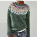 Green fair isle knit sweater detail showcasing colorful yoke pattern and long sleeves cozy fit. - S / Tops / Green