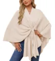 Elegant women solid color knitted cape shawl top with front twist design and V-neck styling detail. - One Size / Apricot