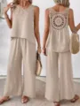 Detail view showing the elegant hollow crochet back design of this chic beige linen outfit. - Light Khaki
