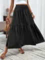 Black tiered maxi skirt detail, high waist pleated design, elegant women apparel showcase. - Solid Black