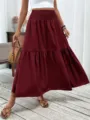 Women's high waist smocked tiered maxi skirt solid burgundy long casual skirt for daily wear. - Burgundy