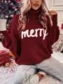 Close-up detail of the cozy burgundy turtleneck sweater featuring white merry knit lettering. - S / Tops / Burgundy