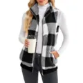 Detail shot of a women's black and white buffalo check fleece vest with cozy zip-up collar. - S / Tops / Black